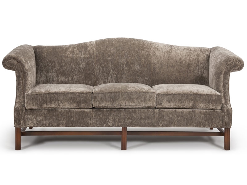 The Chippendale Sofa features true Marlborough legs, tight camel back is high and graceful, rolled arms and welted seat cushions plus two toss cushions.
