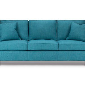 The Cooper/ Crawford sofa features stylish scoops on slender track arms, box back cushions and a plain front edge, tapered leg or tapered leg and base.