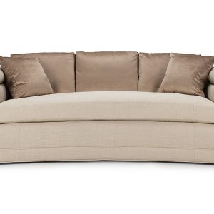 The Marilyn Sofa features a curved front and back enhanced by sophisticated, detailed piping on the arms and back, and a tailored bench cushion.