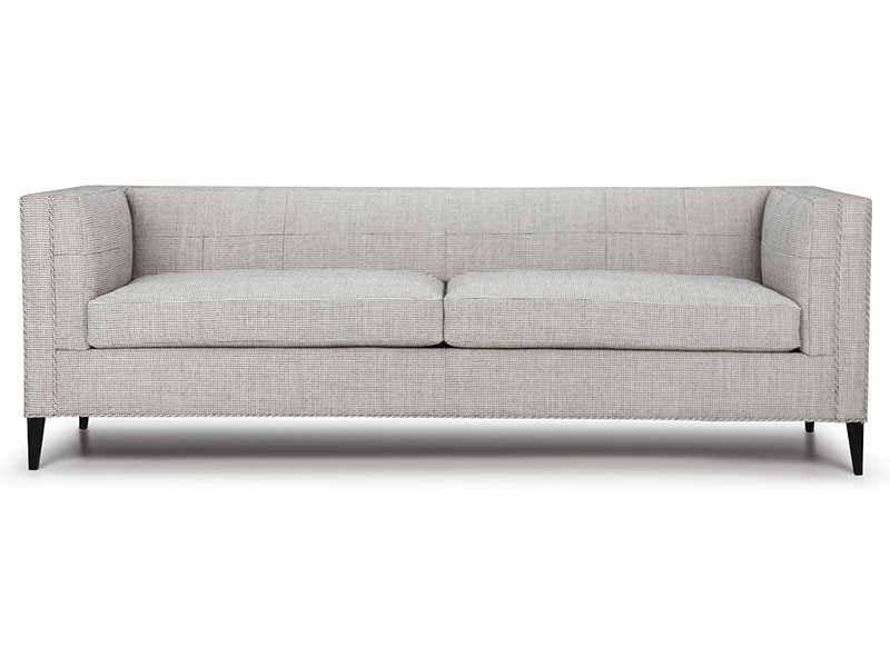 The Matteo Sofa has a deco vibe yet speaks modern Italian in clean straight lines. Enhanced by the supple modern tufting on the tight back and armrest.