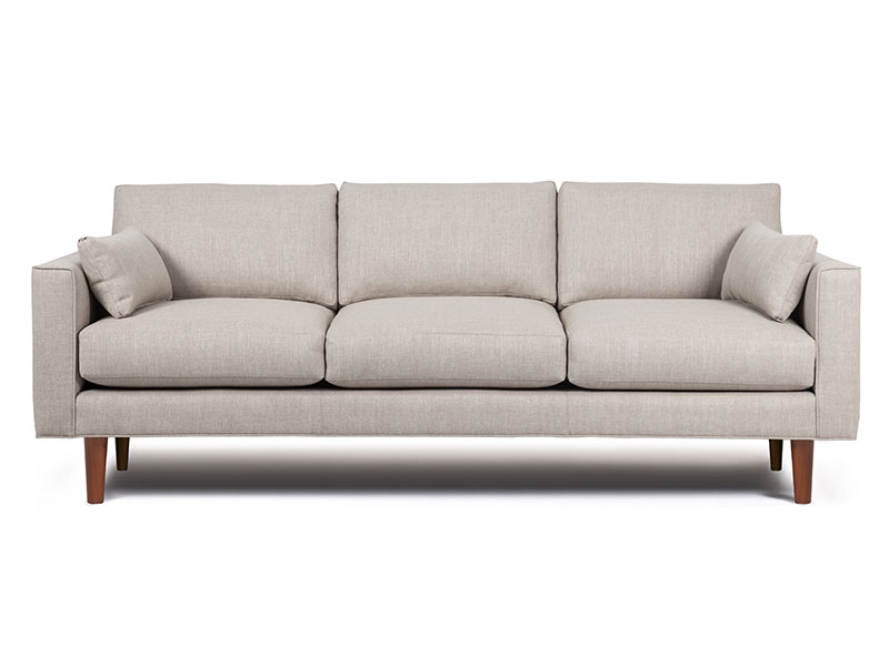 The Maxime mid-century styled sofa collection. The Maxime Sofa features elegant, sleek proportions, and smooth conical legs.