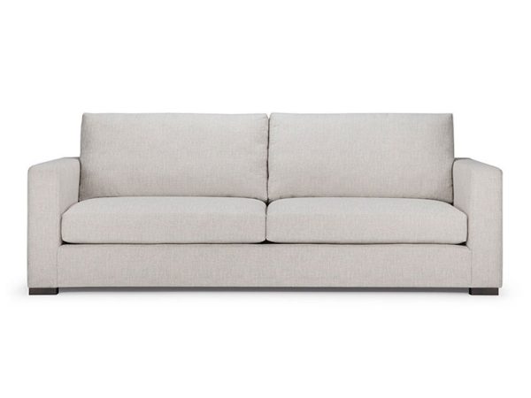 The Trent Sofa features a smoothly rounded track arms balance the flat-seamed seat and back cushions and solid front band.