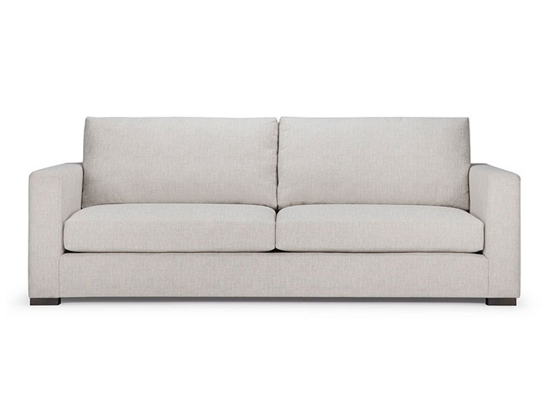 The Trent Sofa features a smoothly rounded track arms balance the flat-seamed seat and back cushions and solid front band.