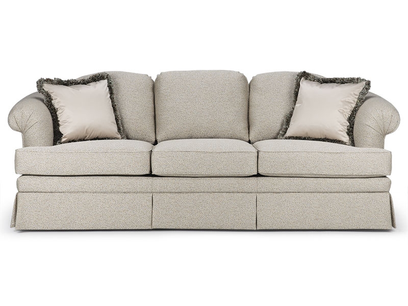 The Turner/Telford Sofa features a gently sloping back with ample fan-pleated arms and a high valance, and T-cushion seating.